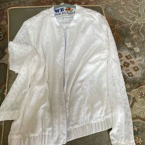 White jacket with zipper and pockets